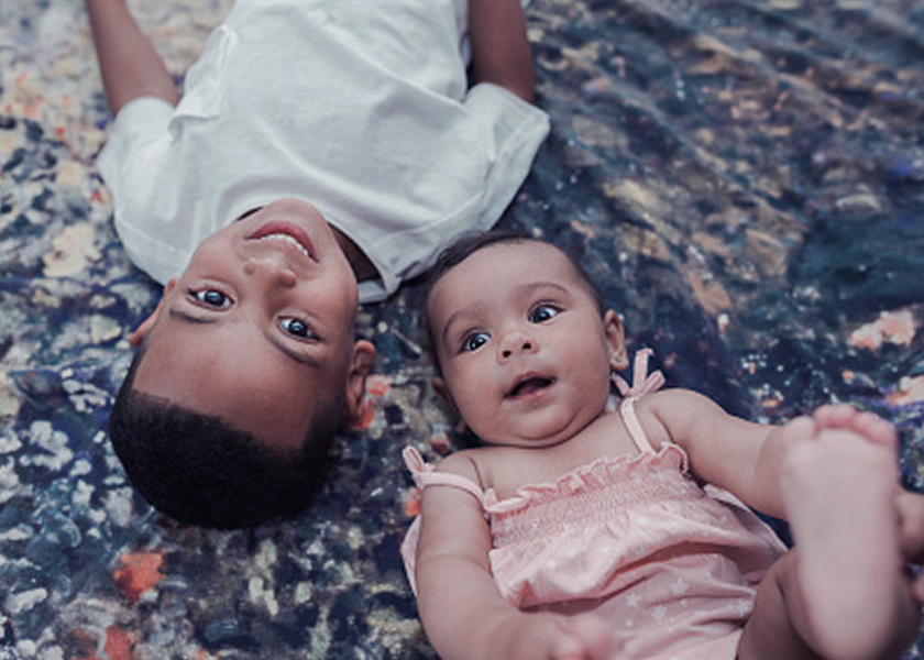 Two healthy happy children smiling
